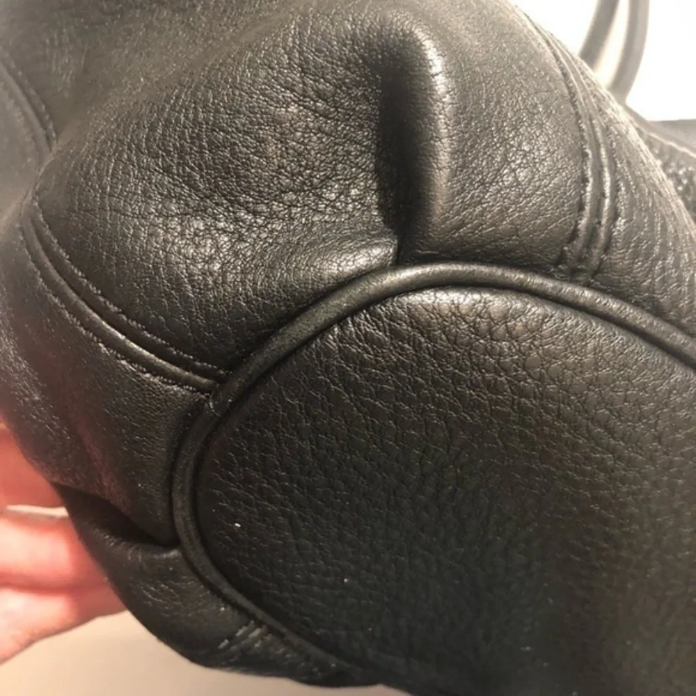 Michael kors black leather ringed tassel bag